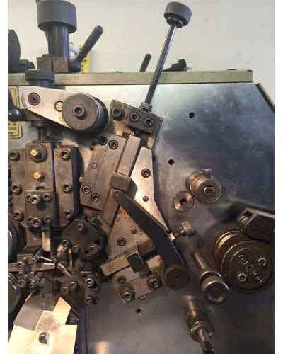CNC machine to make compression springs